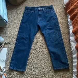Size is 34x29, Wrangler brand, dark wash blue, pristine condition.